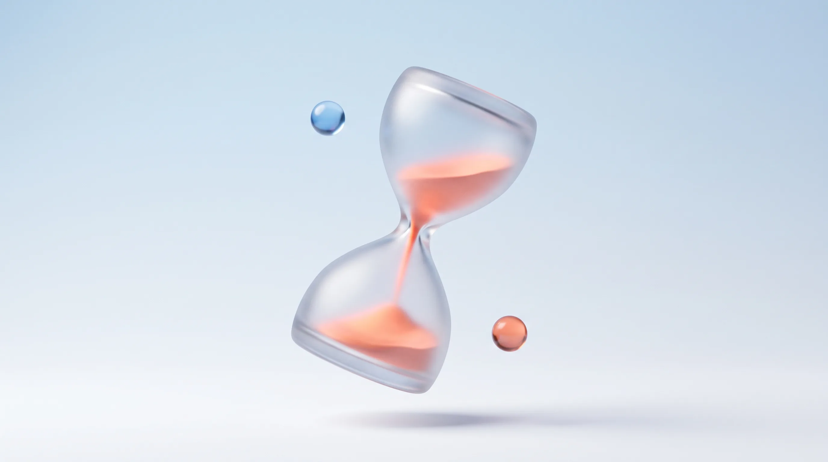 A glass hourglass glyph with a warm coral-orange glowing core, representing honest urgency and scarcity