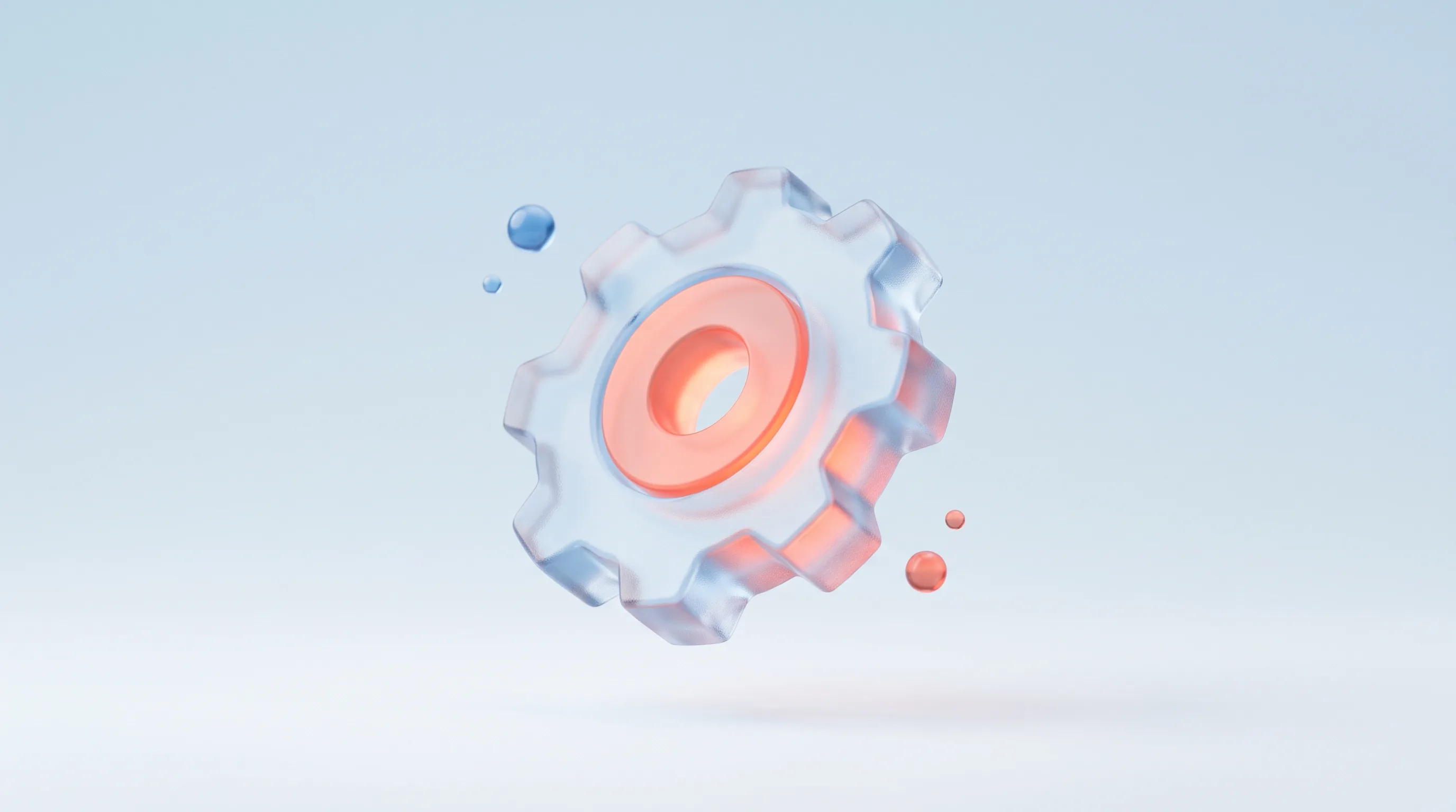 A single sculptural glass gear wheel with a warm glowing core, representing marketing automation