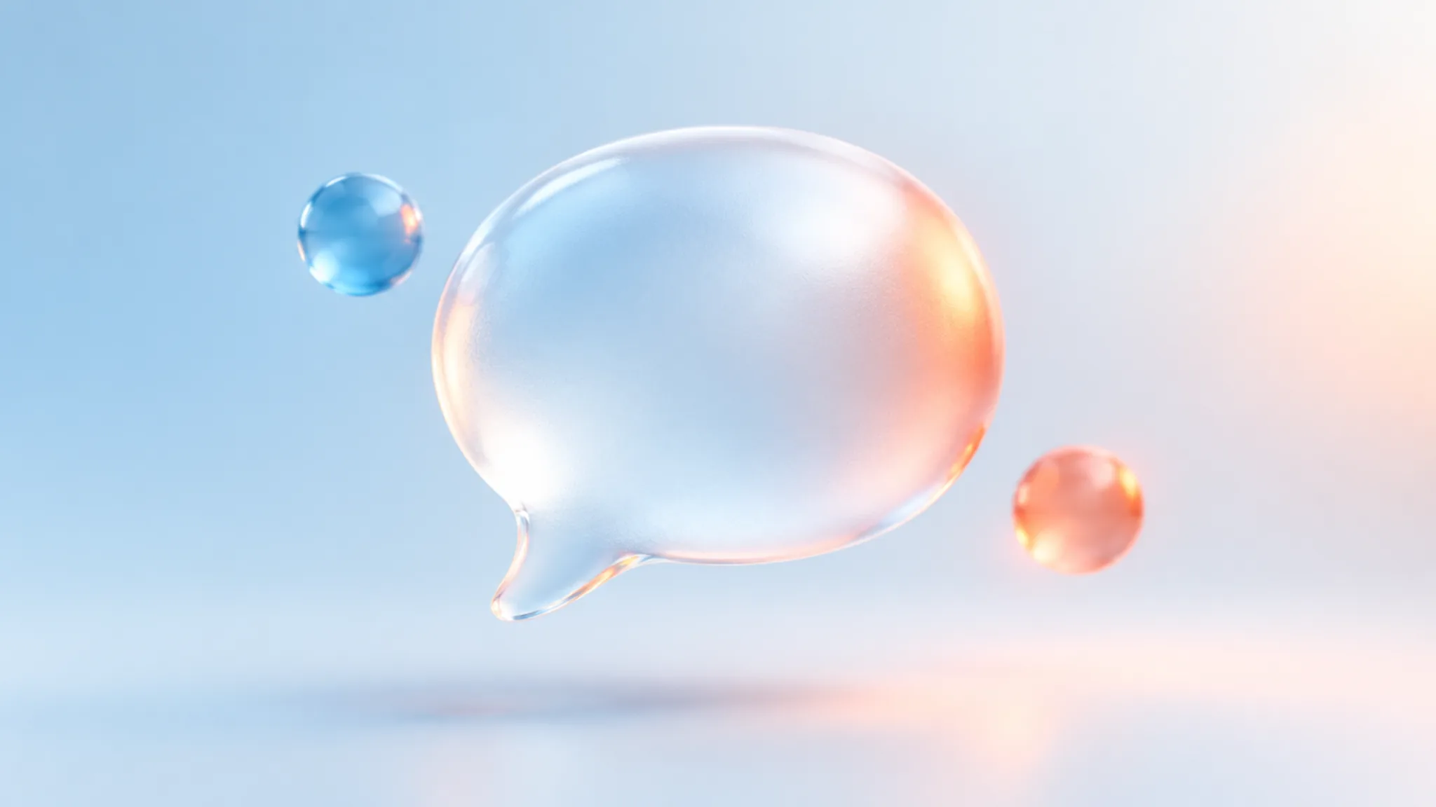 A frosted-glass speech bubble glyph softly lit on a pale gradient with a warm coral glow